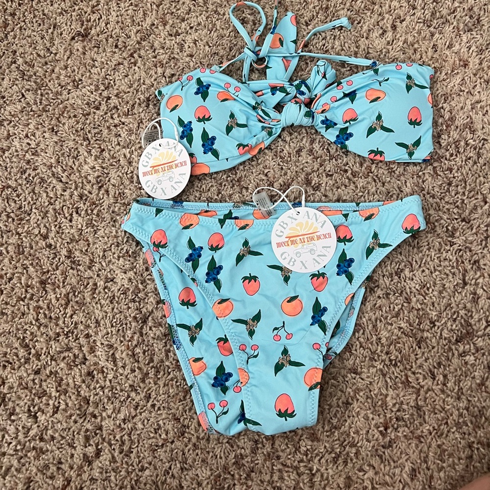 Brand new swim suit size M